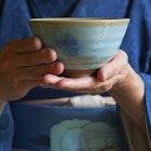 522104956
tradition:CB2, one person:CB2, etiquette:CB2, relaxation:CB2, patience:CB2, quiet:CB2, travel:CB2, tea service:CB2, simplicity:CB2, indoors:CB2, Japanese ethnicity:CB2, kimono:CB2, tea ceremony:CB2, traditional style:CB2, zen-like:CB2, Kyoto:CB2, japanese women:CB2, ancient capitols:CB2
An interior view shows a woman in traditional kimono holding a teabowl during a tea ceremony in the tearoom of a residence near Shugakuin in the Sakyo district of northeast Kyoto, Japan - stock photo