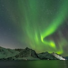 Northern lights, Aurora Borealis, with the Husfjellet mountain, Tungeneset, Senja Island, Troms Norway Europe License Type: media Download Time: 2023-08-01T15:50:51.000Z User: FergalCo Is Editorial: No purchase_order: