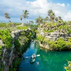 PLAYA DEL CARMEN, MEXICO - JULY 6, 2021: Kayaking at Hotel Xcaret Mexico in Playa del Carmen, Mexico, License Type: media, Download Time: 2025-02-03T21:31:30.000Z, User: bhealy950, Editorial: true, purchase_order: 65050 - Digital Destinations and Articles, job: Lonely Planet Online Editorial, client: Best day trips from Cancún, other: Brian Healy