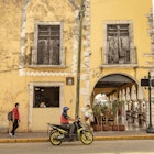 VALLADOLID, MEXICO - August 2022: Traditional mexican style colorful houses in Valladolid town, Yucatan, Mexico
2236005939
adventure, america, ancient, architecture, avenue, beautiful, building, cityscape, colonial, color, colorful, colors, culture, destination, european, facade, historic, historical, history, house, landscape, lawn, maya, mexican, mexico, narrow, old, outside, peninsula, place, religion, road, street, structure, tourism, town, traditional, traffic, urban, valladolid, vintage, yucatan, colonial houses, colorful houses, mexican style, south east, street life, travel mexico, valladolid town, Backpack, Car, City, Handbag, Helmet, Machine, Motor, Motorcycle, Neighborhood, Outdoors, Path, Person, Plant, Road, Shelter, Shoe, Street, Traffic Light, Urban, Vehicle
VALLADOLID, MEXICO - August 2022: Traditional mexican style colorful houses in Valladolid town, Yucatan, Mexico