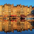 Harbor and Row Houses in City Center of Honfleur, Normandy, France at Sunrise on September morning; Shutterstock ID 2390497095; purchase_order: 65050 - Digital Destinations and Articles; job: Lonely Planet Online Editorial; client: Best places in France; other: Brian Healy
2390497095
architecture, calvados, city, cityscape, color image, day, famous place, france, french culture, harbor, history, honfleur, horizontal, house, idyllic, nautical vessel, no people, normandy, old, outdoors, photography, reflection, row house, sailing ship, september, summer, sunlight, sunrise, tranquil scene, travel destinations, water
Harbor and Row Houses in City Center of Honfleur, Normandy, France at Sunrise on September morning