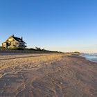 Kilkare, a legendary oceanfront Hamptons mansions in Wainscott, East Hampton, New York. Holden lighting from a setting sun., License Type: media, Download Time: 2025-03-26T20:48:20.000Z, User: Sarahstocking, Editorial: false, purchase_order: 65050 - Digital Destinations and Articles, job: Digital , client: FTG The Hamptons, other: Sarah Stocking