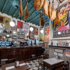 Seville, Andalusia, Spain - June 20, 2024: Old bar in Santa Cruz district, License Type: media, Download Time: 2024-10-03T05:38:15.000Z, User: claramonitto, Editorial: true, purchase_order: 56530, job: Global Publishing-WIP, client: Experience Andalusia 2, other: Clara Monitto
