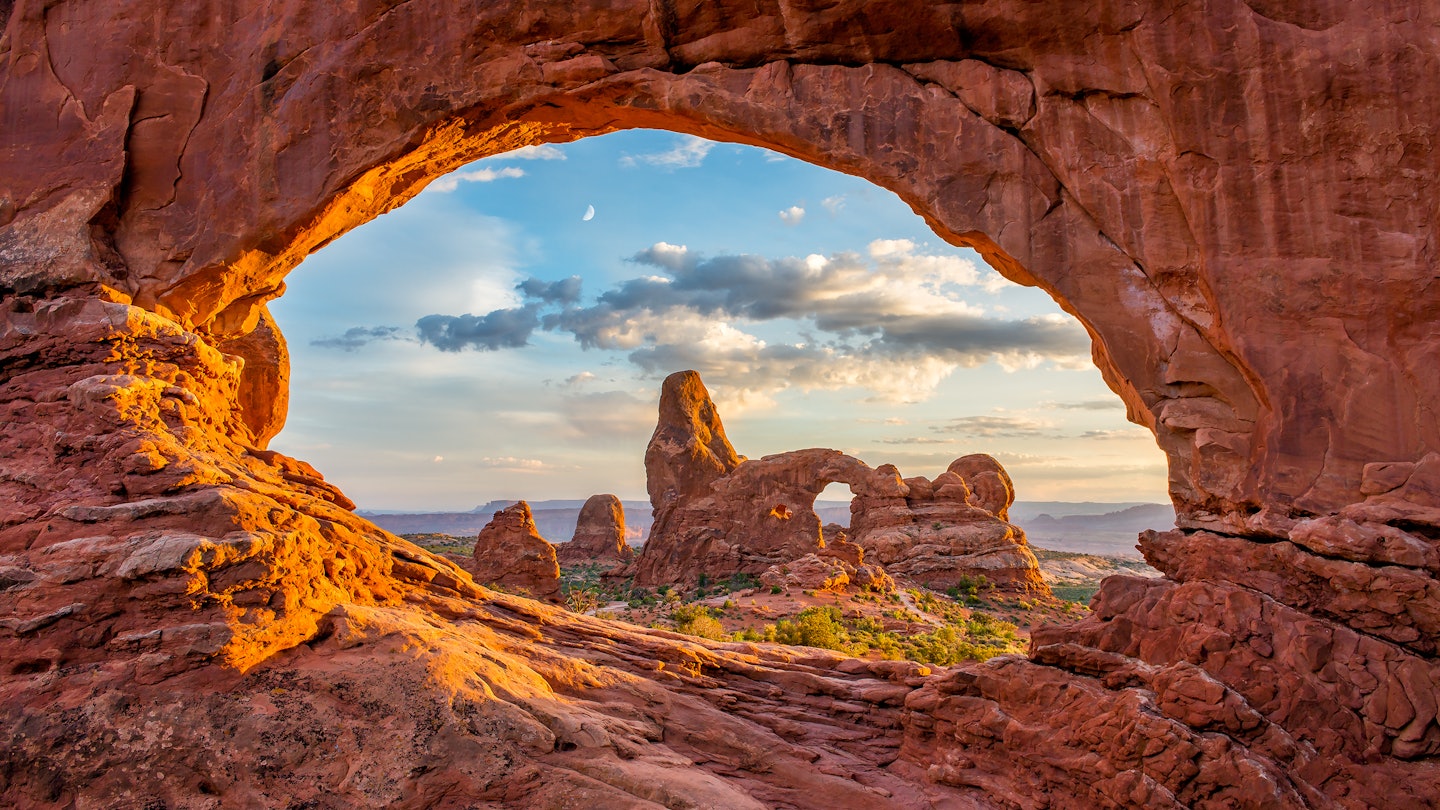 Turret arch through the North Window at Arches National Park in Utah  License Type: media  Download Time: 2023-04-14T12:35:08.000Z  User: Norma.PrauseBrewer_LonelyPlanet  Is Editorial: No  purchase_order: